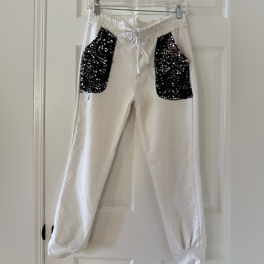 P169- Elegant White Joggers with Black Sequin Accents